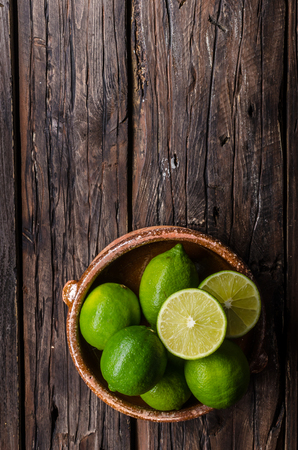 Fresh lime on wood boardの写真素材