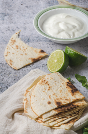 Spicy and delish indian food, with fresh vegetable and lime juice inside garlic dipの写真素材