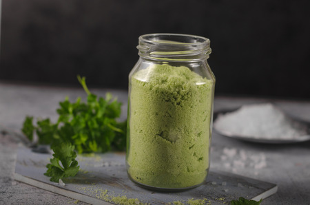 Delish combination coarse-grained salt, fresh herbs mixed togetherの写真素材