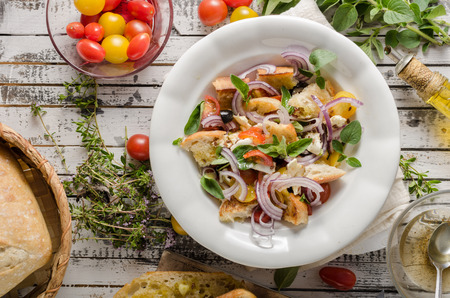 Delicious salad with fresh vegetable, crispy croutons and cheeseの写真素材