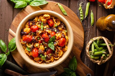 Fresh and simple food, homemade pasta with balsamico tomatoes and herbsの写真素材
