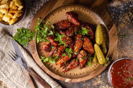 Spicy chicken wings with barbecue sauce, delicious and simple foodの写真素材