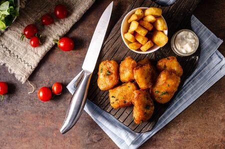 Fish and homemade french fries with delicious tartar sauce.の写真素材