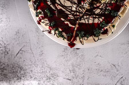 Delicous cake with chocolate, basil sugar and forest fruitの写真素材
