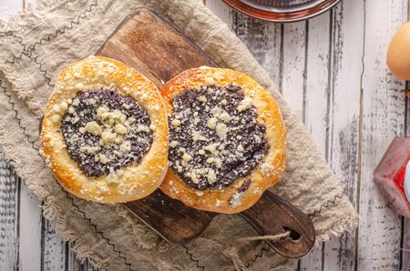 Delicious cakes with currants, poppy seeds and curd