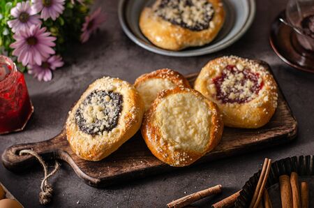 Delicious cakes with currants, poppy seeds and curdの写真素材