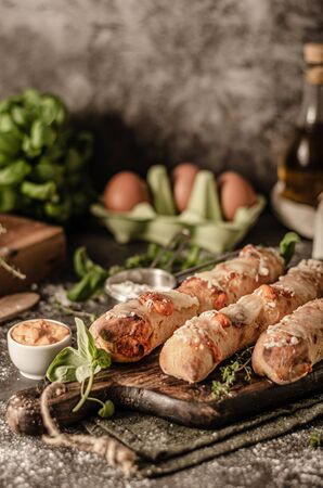 Delicious pastry stuffed with sharp cheese with cheese dipの写真素材