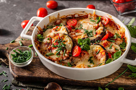 Eggplant baked with cheese, herbs and tomato sauceの写真素材