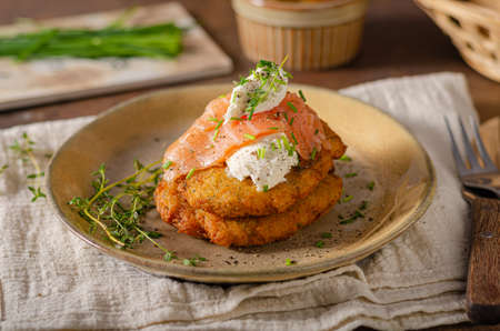Homemade delicious potato pancakes with smoked salmonの写真素材
