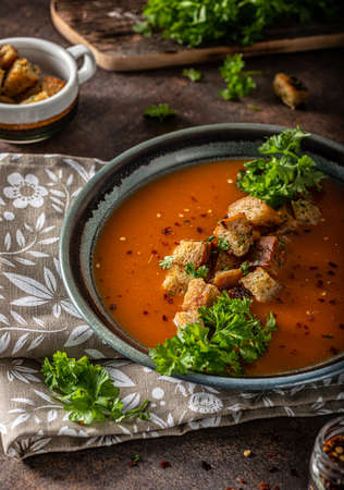 Goulash soup with crispy bread, garlic herbsの写真素材