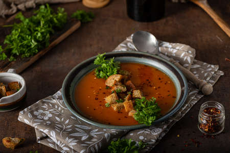 Goulash soup with crispy bread, garlic herbsの写真素材