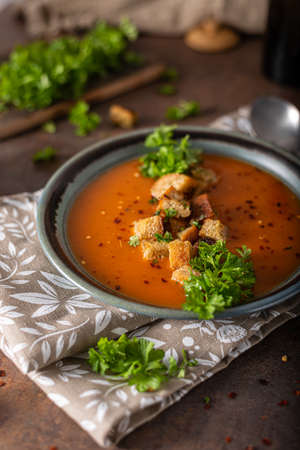 Goulash soup with crispy bread, garlic herbsの写真素材