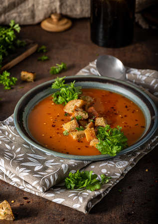 Goulash soup with crispy bread, garlic herbsの写真素材