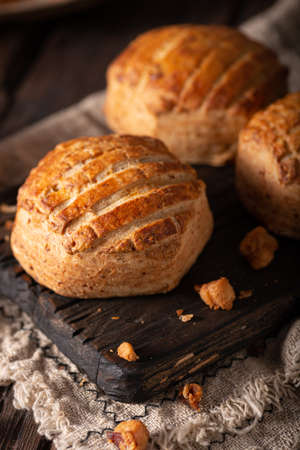 Delicious homeade bun filled with pork greaves and garlicの写真素材