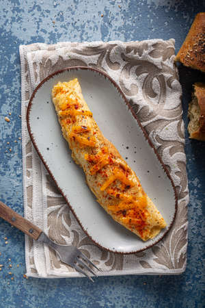 Delicious omelette from organic eggs with chilli and cheddarの写真素材