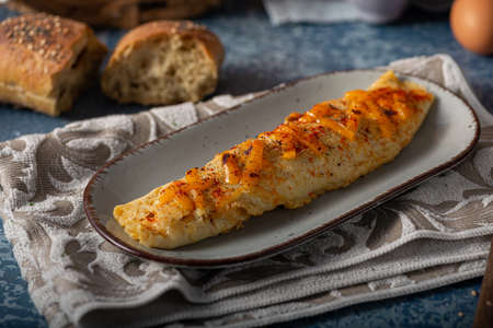 Delicious omelette from organic eggs with chilli and cheddarの写真素材