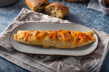 Delicious omelette from organic eggs with chilli and cheddarの写真素材