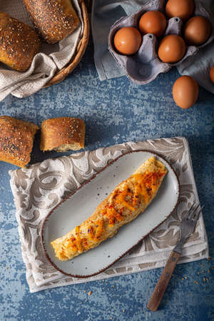 Delicious omelette from organic eggs with chilli and cheddarの写真素材