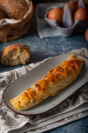 Delicious omelette from organic eggs with chilli and cheddarの写真素材