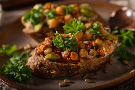 Fresh and healthy food, spicy hummus with breadの写真素材