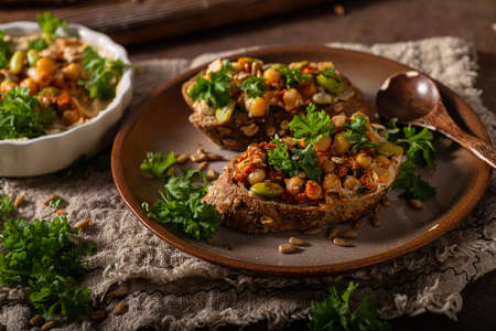 Fresh and healthy food, spicy hummus with breadの写真素材