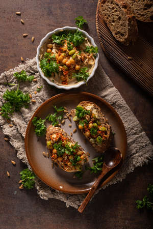 Fresh and healthy food, spicy hummus with breadの写真素材
