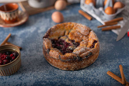 Delicious pie with fresh berries and lemonの写真素材