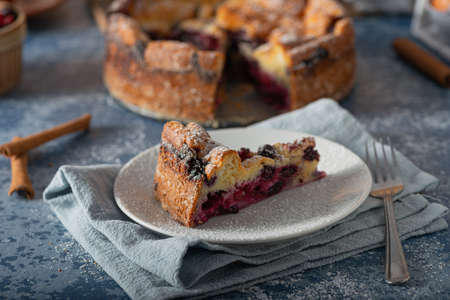 Delicious pie with fresh berries and lemonの写真素材