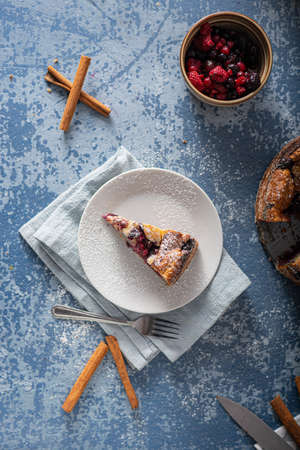 Delicious pie with fresh berries and lemonの写真素材