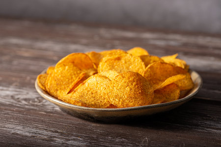Delicious tortilla chips witch chili and cheese sauceの写真素材