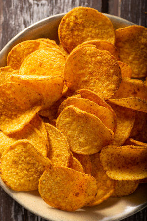 Delicious tortilla chips witch chili and cheese sauceの写真素材