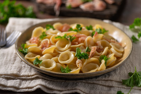 Delicious pasta with garlic, ham and parmesanの写真素材