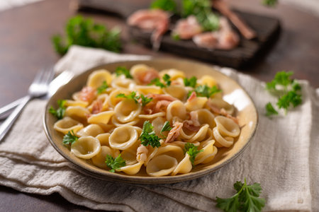Delicious pasta with garlic, ham and parmesanの写真素材