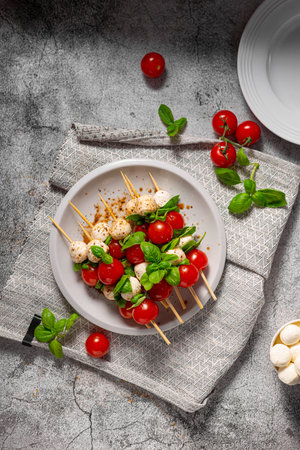 Simple and beautiful food with basil, mozzarella and balsamic vinegarの写真素材