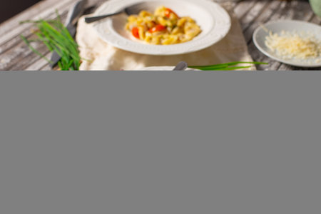 Delicious pasta stuffed with meat and cream sauce with garlic and herbsの写真素材
