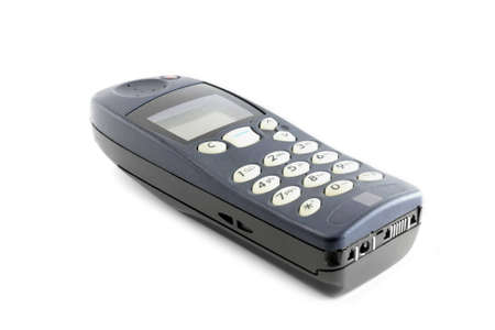 Vintage cell phone isolated on whiteの写真素材