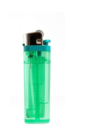 A green translucent disposable cigarette lighter isolated against a white backgroundの写真素材