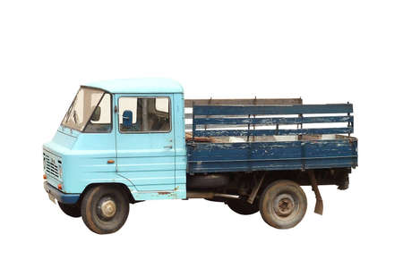 Old East European truck in very worn condition isolated on whiteの写真素材