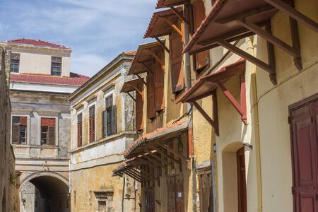Typical street in the old town of Rhodes in Greece showing medieval type streets and architectureの写真素材