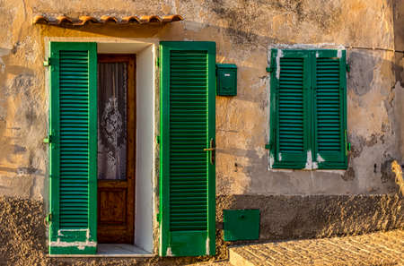 Italy City Window Door Green Capoliveriの写真素材