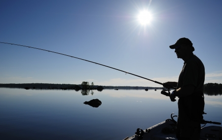 Angler shadow in morning sunの写真素材