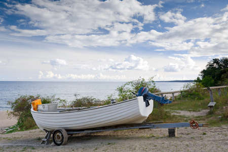 Fisherman boat on the sea coast の写真素材