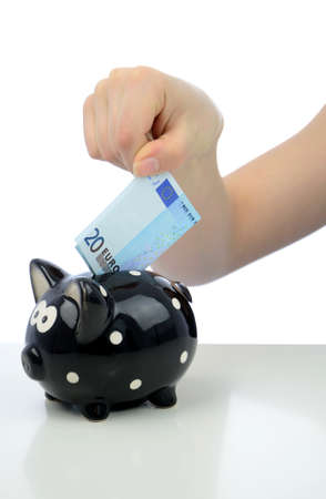 Twenty euro investment to piggy bank の写真素材