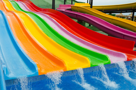 Colorful slides in tropical outdoor parkの写真素材