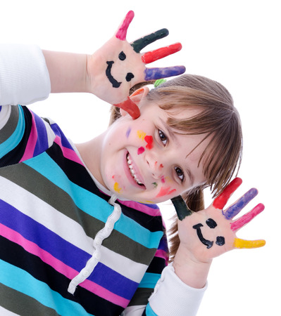 Adorable child girl have paint with paintingの写真素材