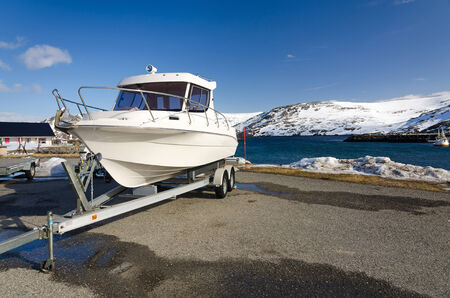 Fast fishing boat on a trailerの写真素材