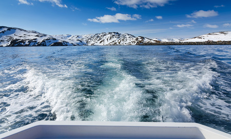Boat traveling in Barents seaの写真素材