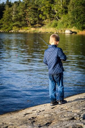 Little boy fishingの写真素材