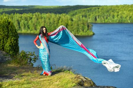 Oriental girl in Swedish natureの写真素材