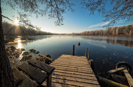 Sunrise over the frozen lakeの写真素材